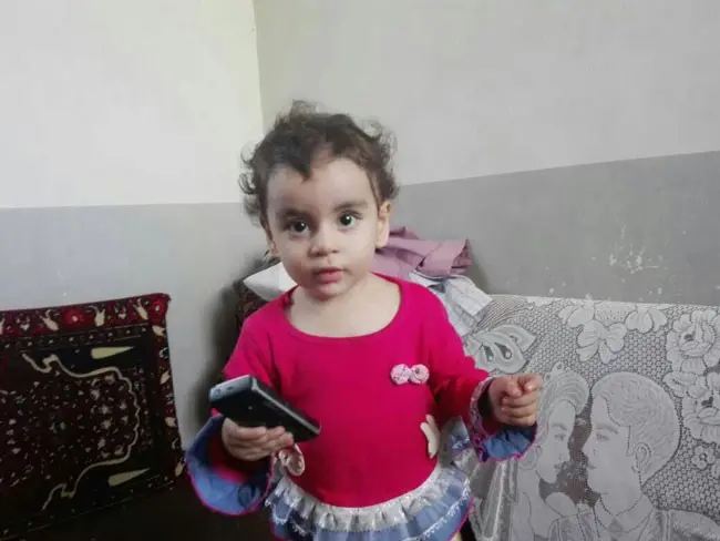 کودکی که مادرش سرش را برید