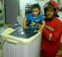 ﻿ نجات بچه بازیگوش ازداخل ماشین لباسشویی